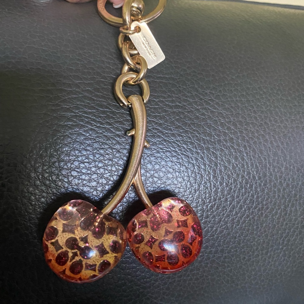 Coach Signature Cherry Bag Charm w/ ****FREE Coach Snow Flake Bag Charm****